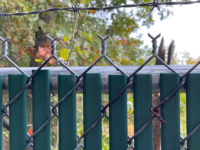 Privacy Slat Installed within Chain Link Fencing